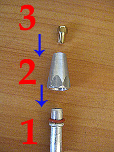  La composición de la boquilla.