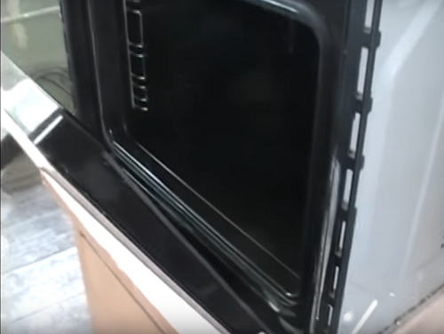  Abrir la puerta del horno