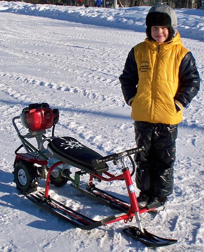  Moto de nieve para niños.