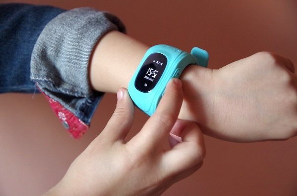  Reloj en mano de niños.